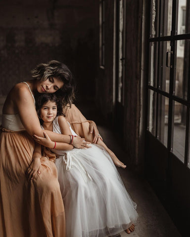 Studio shot of Ayelen and her daughter