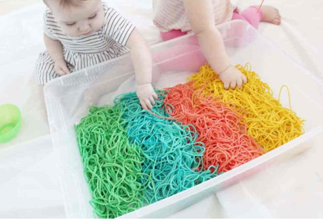 Rainbow noodles are great for fine motor skills and hand-eye coordination.