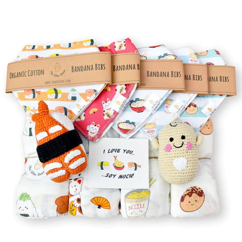 The Wee Bean's gift set includes sushi onesie with a sushi teething toy, plush toy, and blanket, all wrapped up in a reusable sushi roll-inspired package.