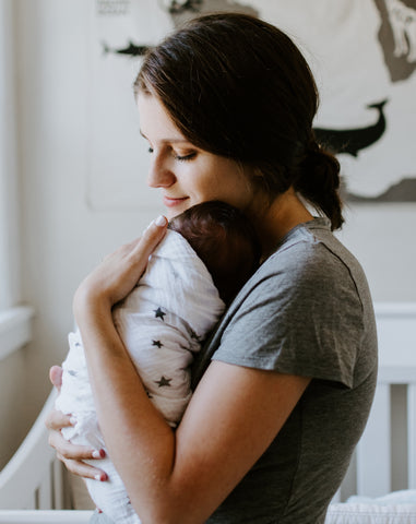 Feel your baby's neck and ears to identify signs of overheating