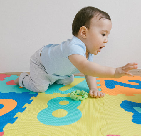 To start tummy time, find the right surface that is safe, flat, and clean