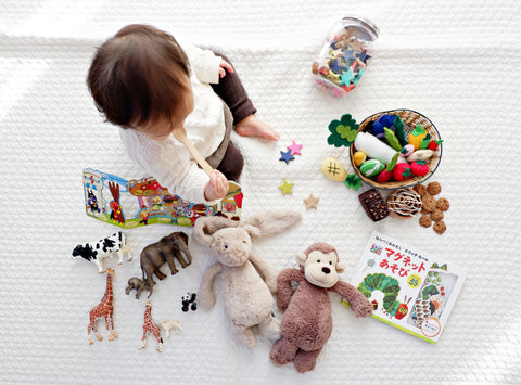 During tummy time, use toys and props to keep your baby engaged