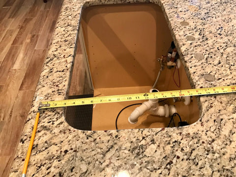 Measure the sink hole 