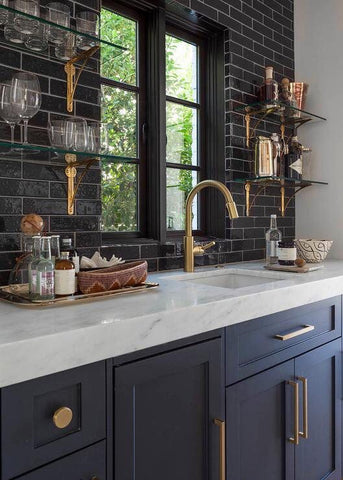 Gold Faucet in a Kitchen