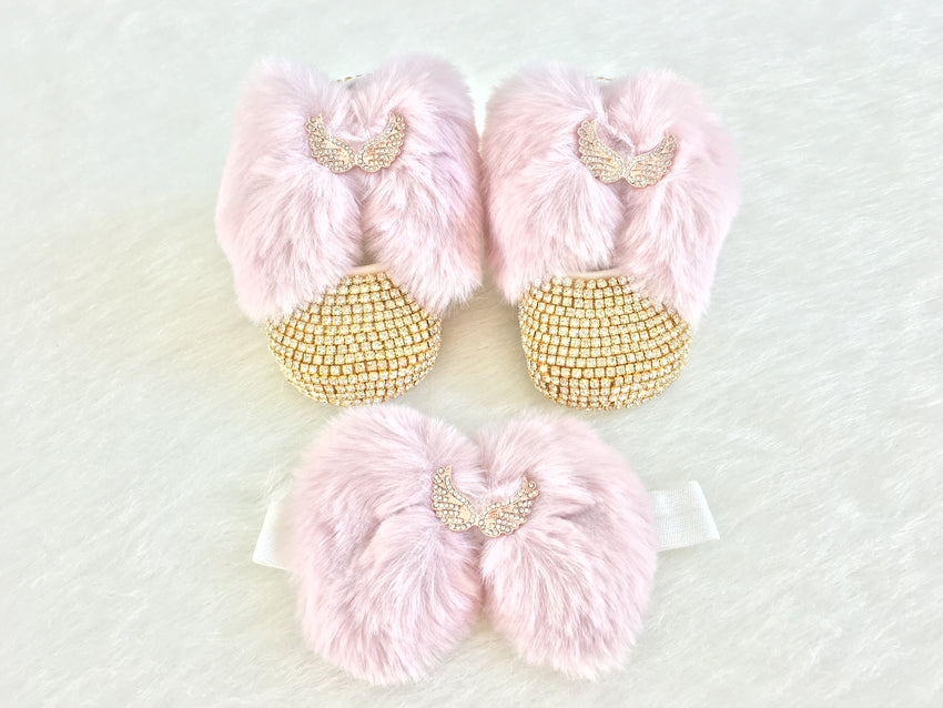 pink and gold baby shoes