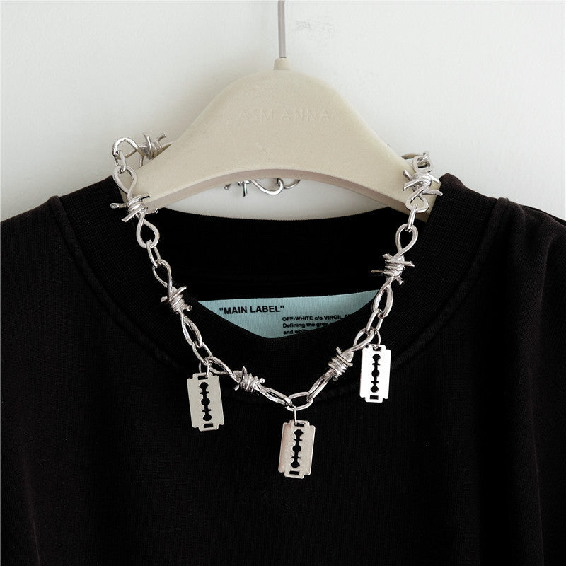 razor blade and safety pin necklace