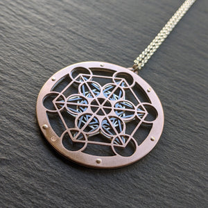 Large Metatron's Cube Pendant by Jean Burgers Jewellery. Handcut from sterling silver and copper, with gold rivets.