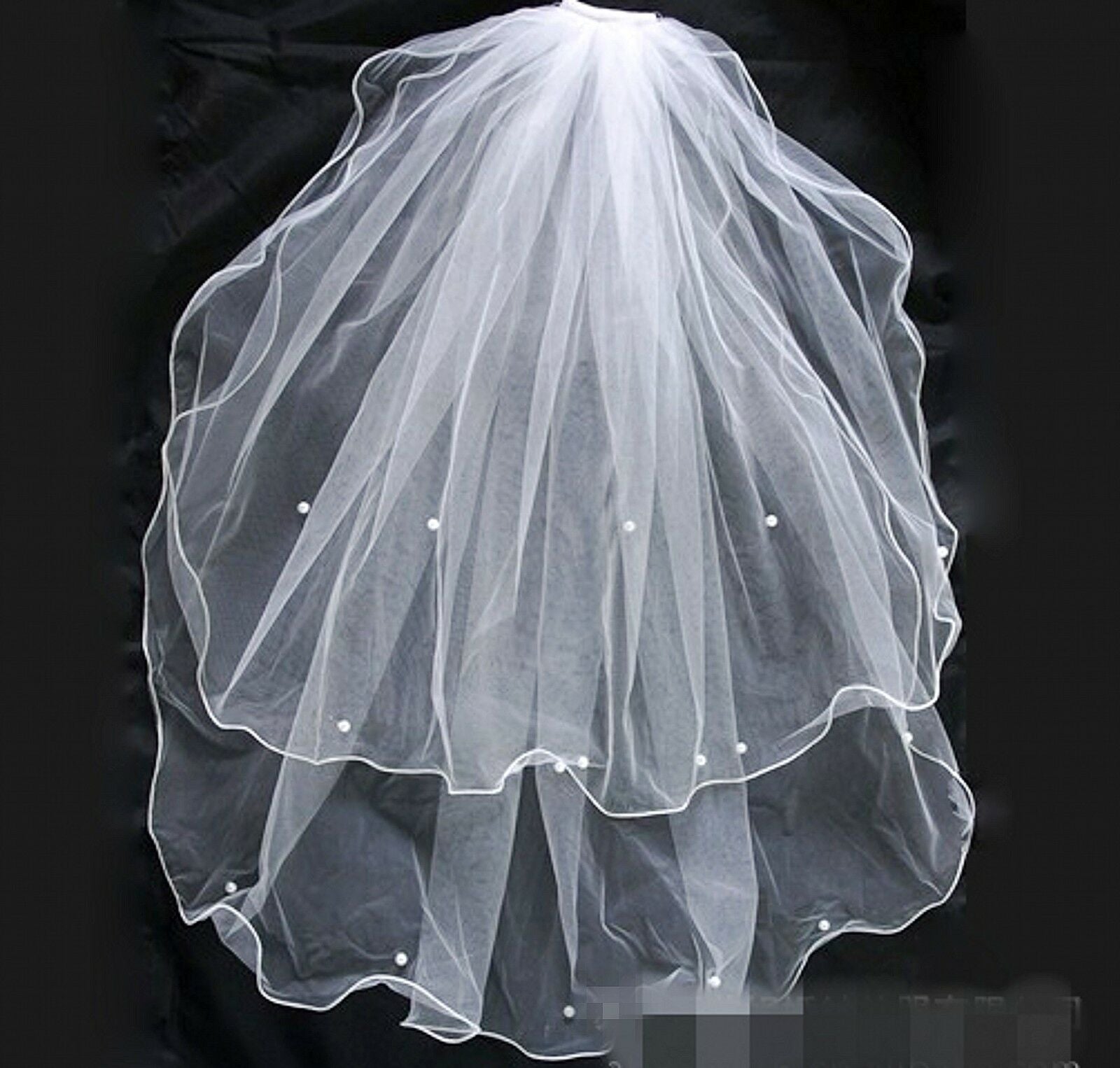 white pearl wedding dress