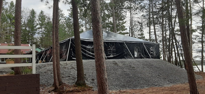 black tent with sidewalls