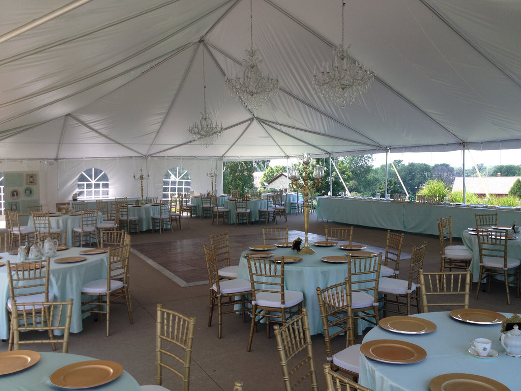 wedding tent decorated for a reception