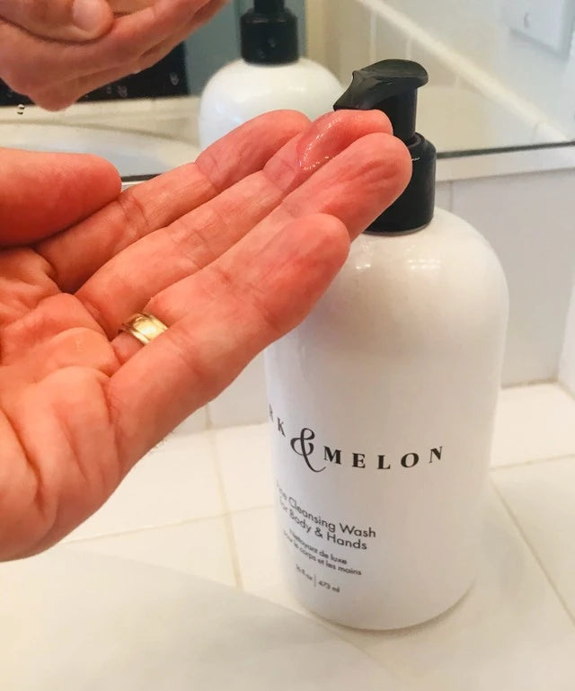 man applying hand soap