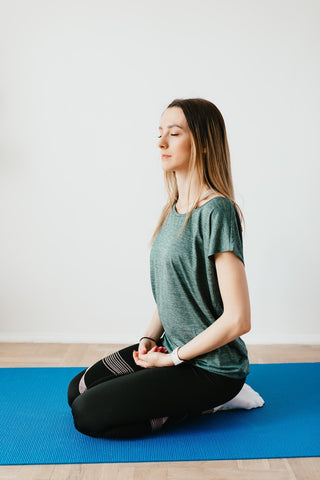 Women sitting down and breathing