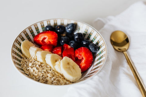a bowl of oats with fruit