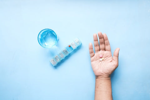 Person holding medication