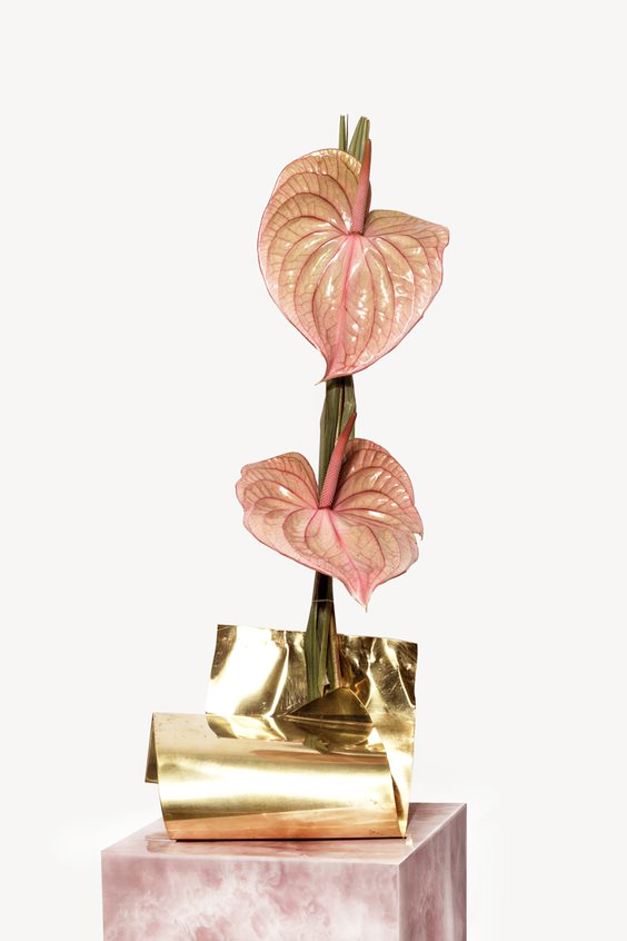 Anthurium used as centrepiece with gold and marble