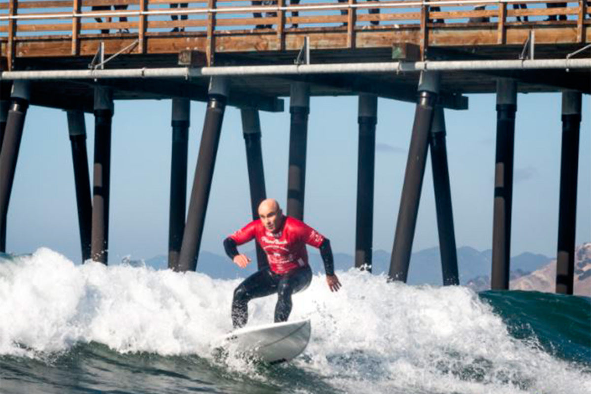 Aitor ‘Gallo’ Francesena surfing at the ISA adaptive surf world championships in california wearing a c-skins ReWired 3:2 Chest Zip wetsuit