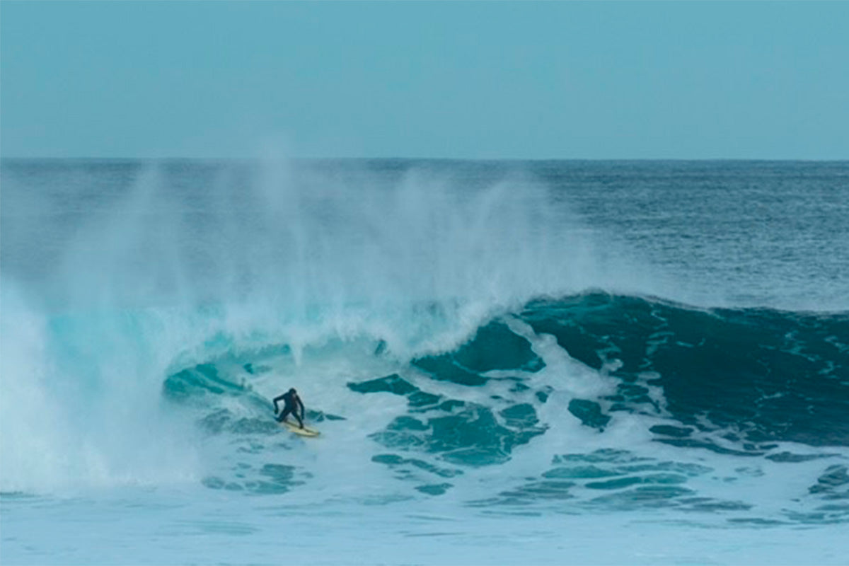 c-skins team rider joel stevenson surfing in the lofoten islands in norway