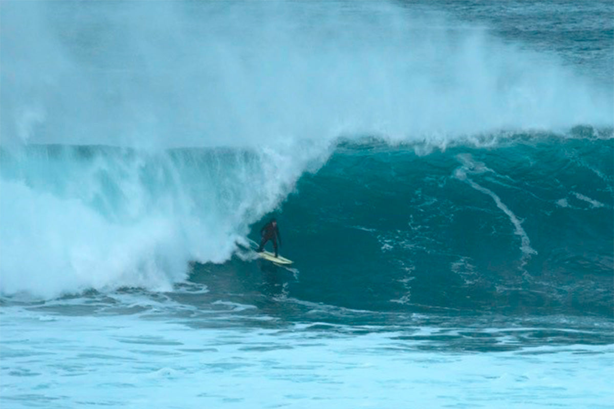 c-skins team rider joel stevenson surfing in the lofoten islands in norway