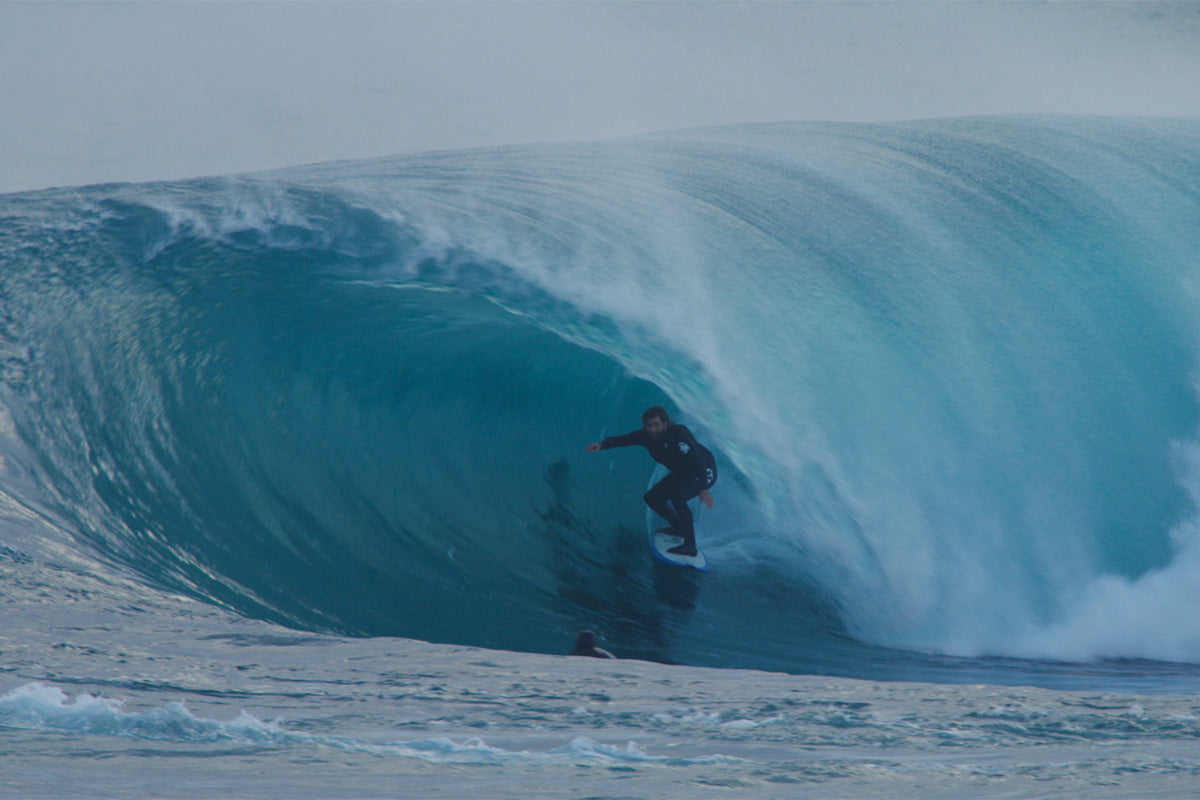 wade carmichael surfing a large barrelling wave in australia