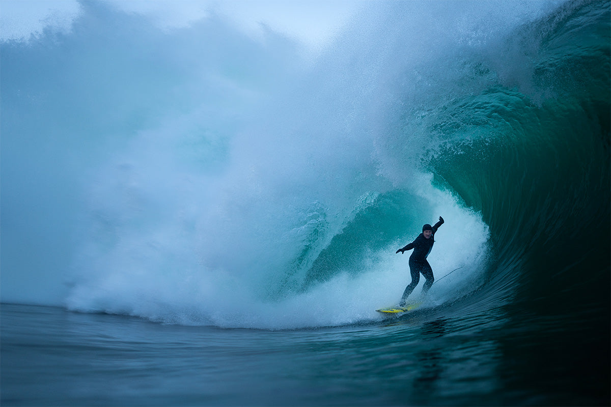 ollie surfing a huge barrel in Ireland 