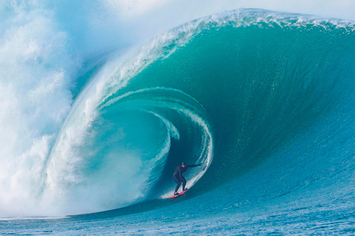 ollie surfing a huge barrel in Ireland 