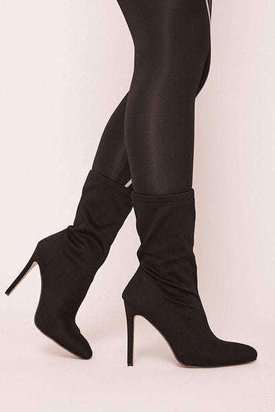 black stiletto sock boots