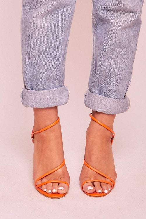 orange strappy shoes