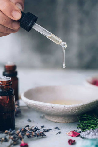 Essential Oil dripping onto a dish