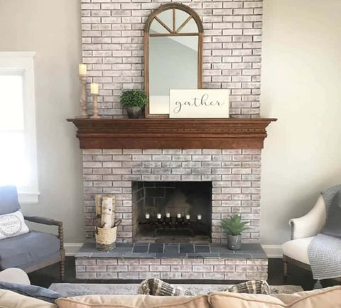 whitewashed fireplace in living room