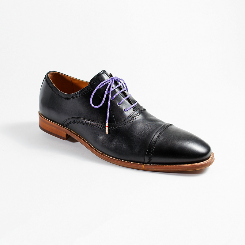 purple and white dress shoes