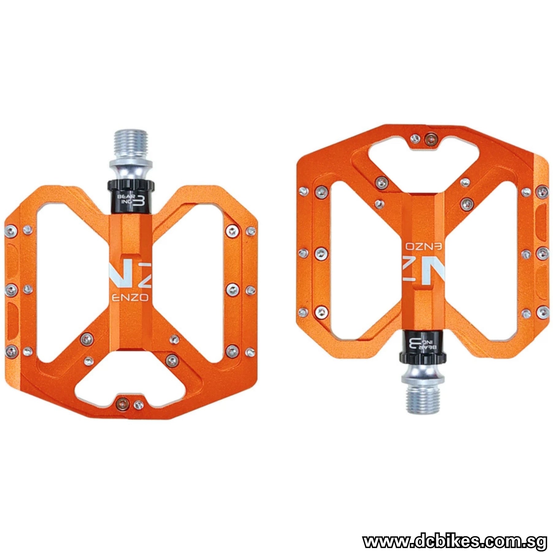 black and orange mtb pedals