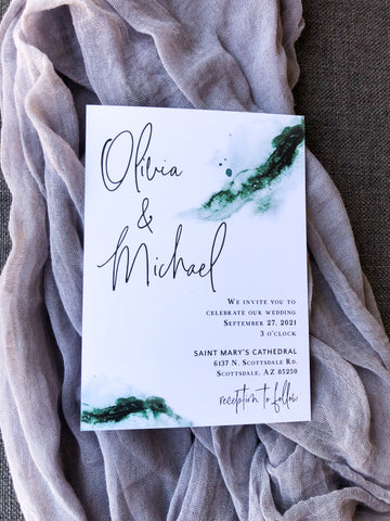 Green watercolor wedding invitations. The watercolor looks like a geode on the side and it is simple gorgeous! These are perfect for a fall wedding.