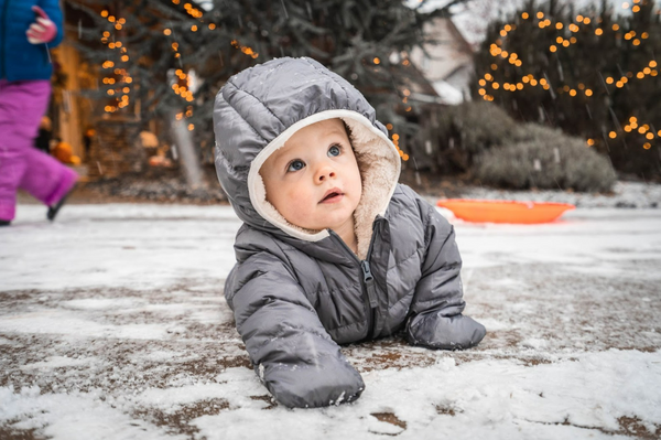 Baby in puddle suit