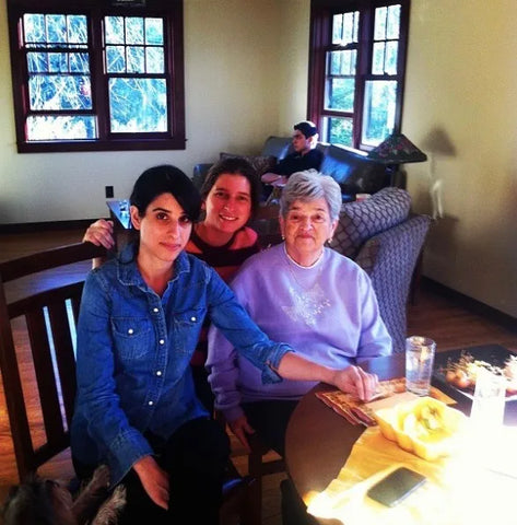 A grandmother with her two granddaughters