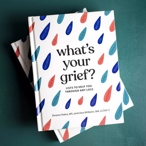 What's Your Grief? Book Cover on a blue table