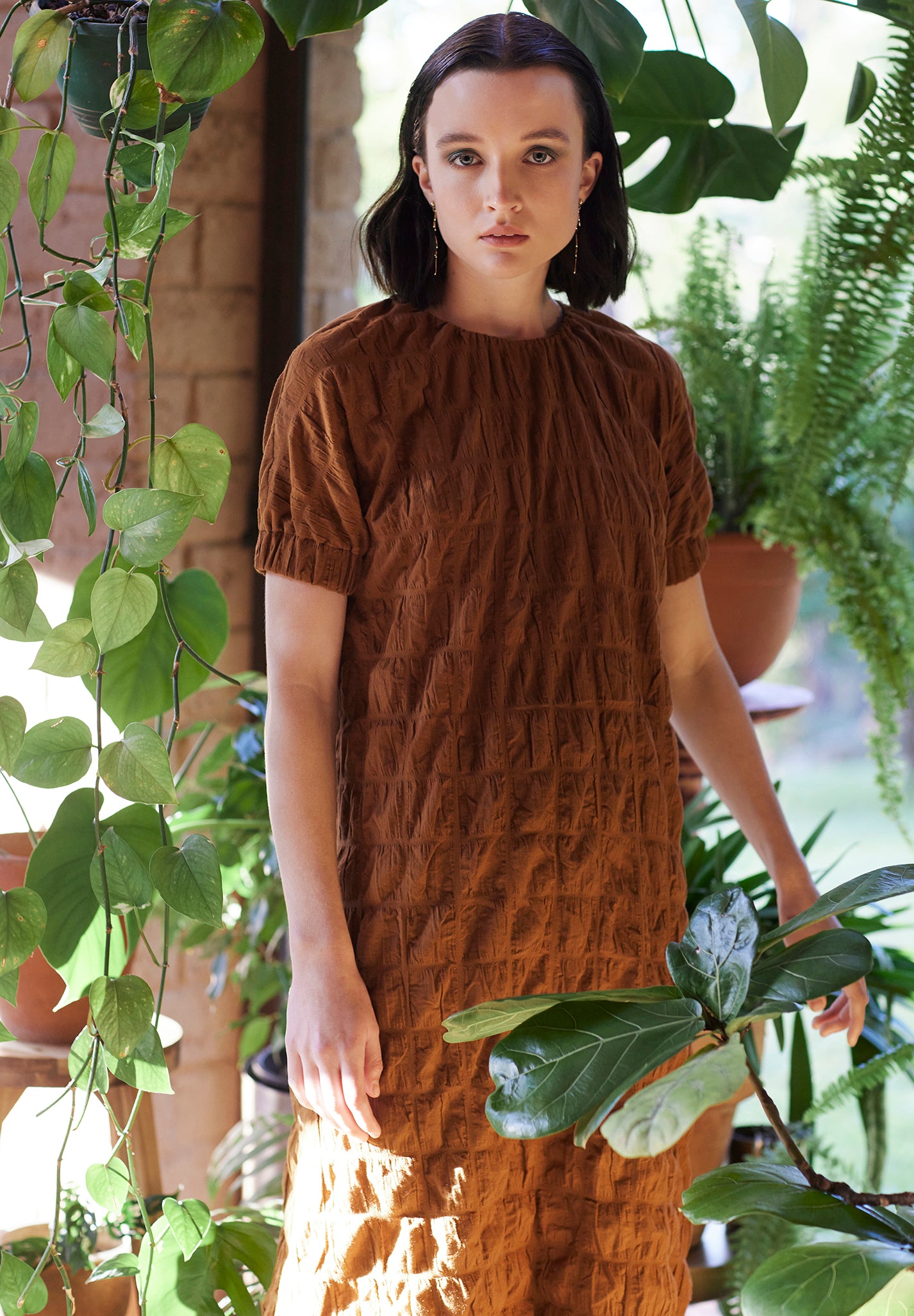 orange brown gathered short sleeved dress plant conservatory campaign keegan the label