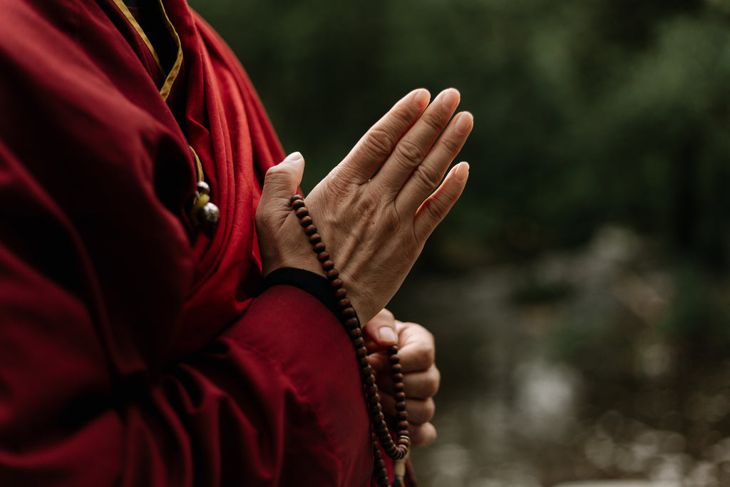 Tibetan Buddhist praying 