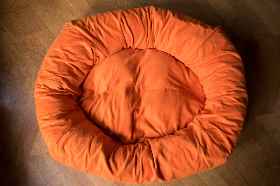 cosy orange dog bed