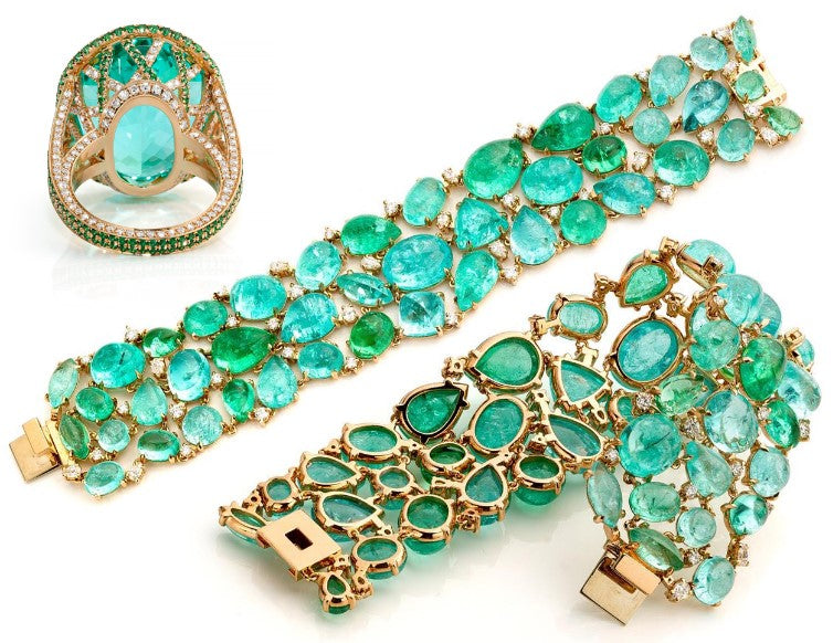 blue green paraiba tourmaline stones set on a gold bracelet