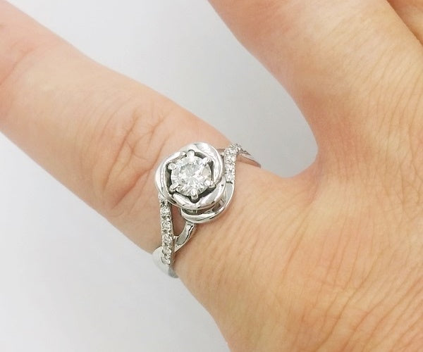 unique engagement flower ring with diamonds