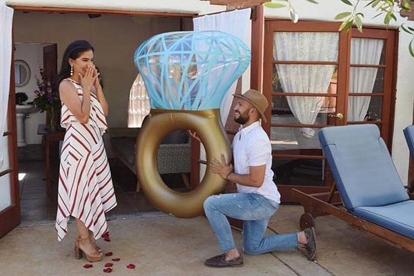 funny proposal with giant inflatable ring