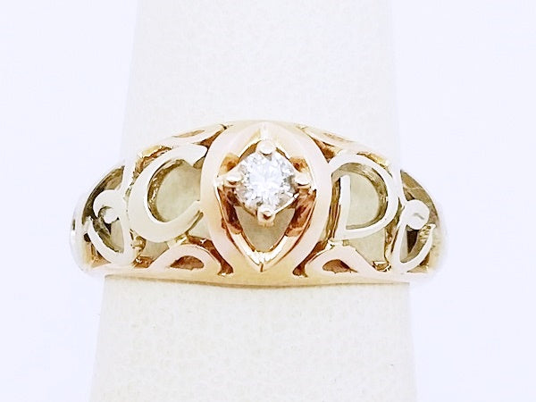 initial engagement ring in gold with diamond