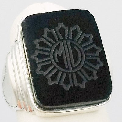 Onyx intaglio set on silver signet ring