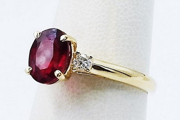 unique engagement ring design with a 2-carats ruby stone setting