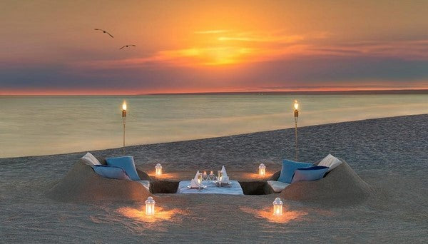 beach private dinner set up for marriage proposal
