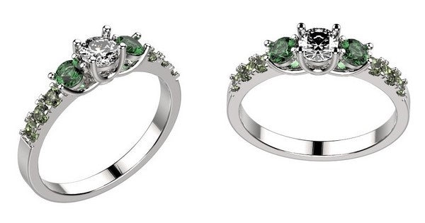 unique engagement ring design with emerald stones and diamond