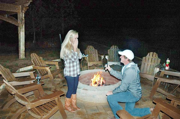 marriage proposal around a firepit outdoor