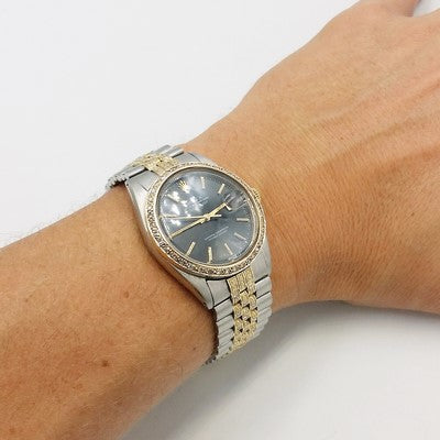 diamond rolex watch on the wirst of a man