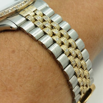 detail of the iced out diamonds on the rolex watch bracelet