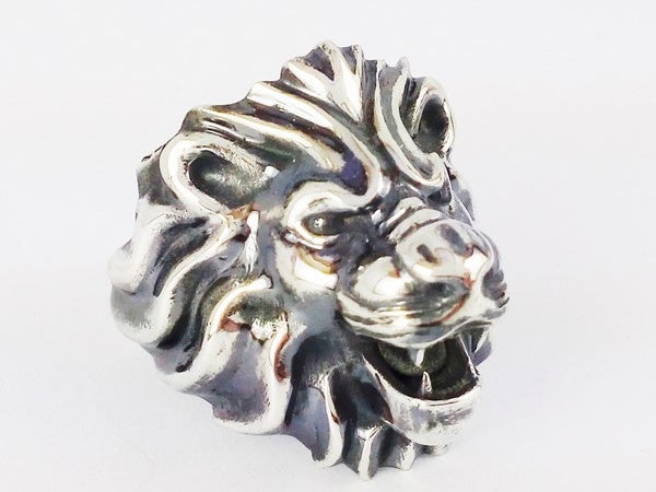 african silver ring with lion's head
